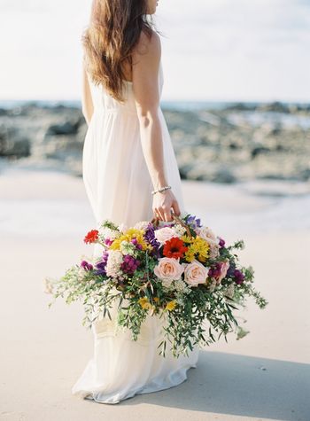 a-beachside-engagement-shoot-with-bright-flowers-in-phuket-1